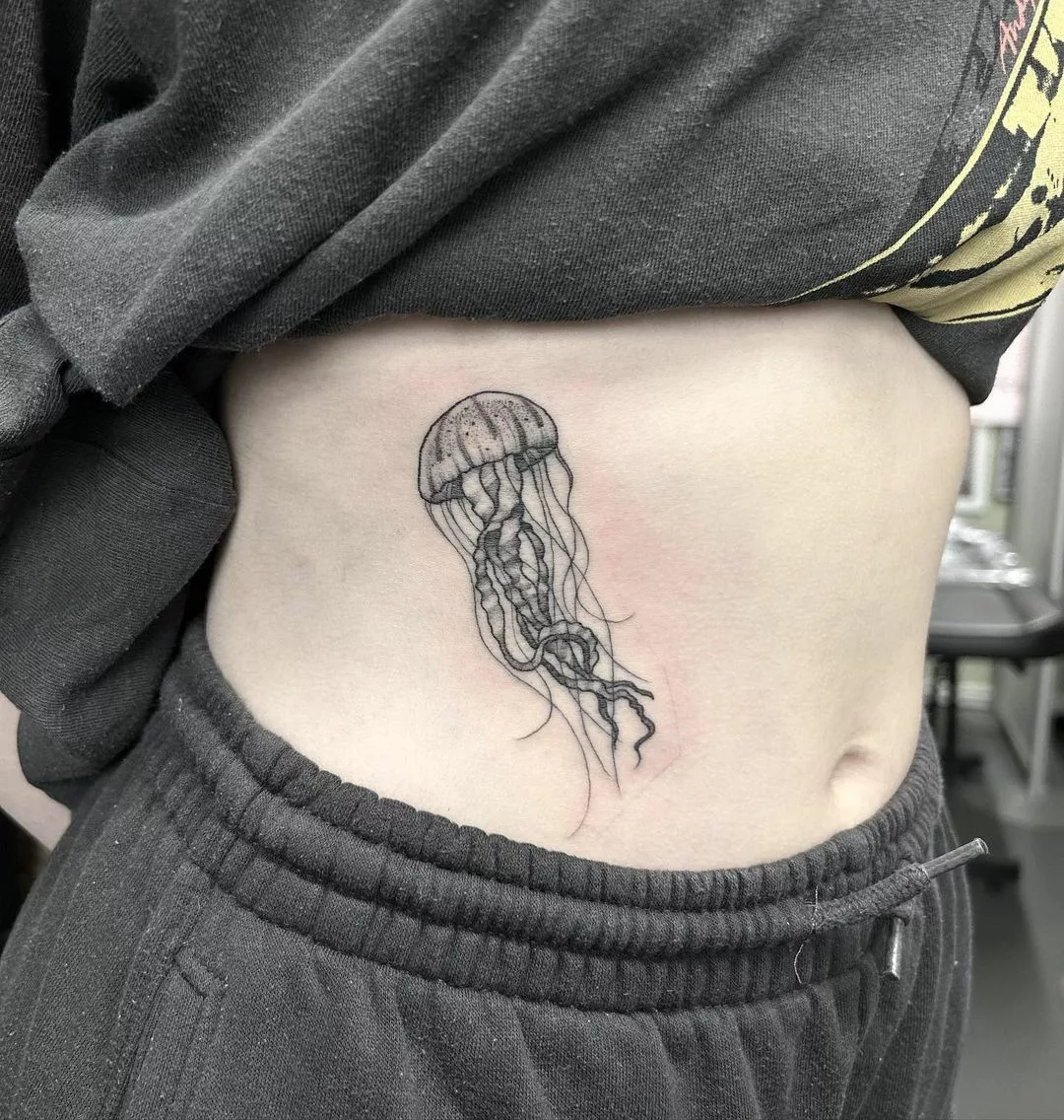 rib tattoo for women