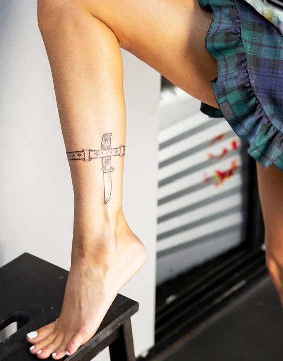 Woman with Tattoo on Her Leg  Free Stock Photo
