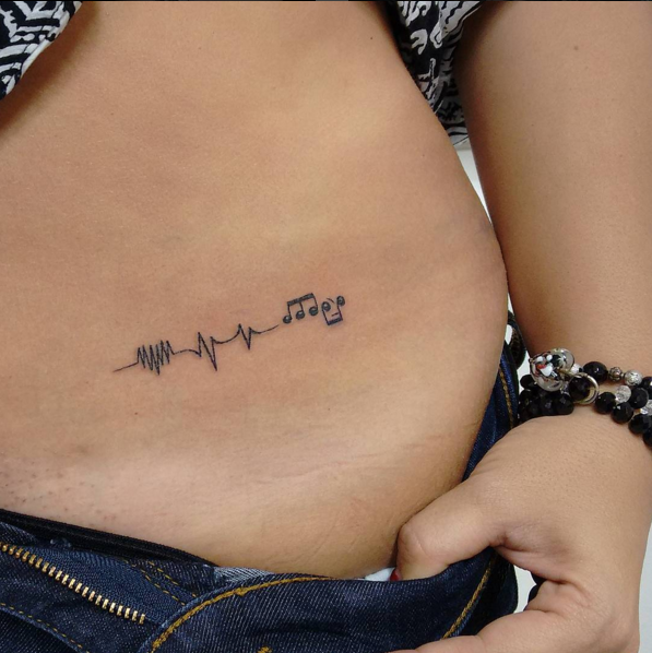 Feminine Stomach Tattoos