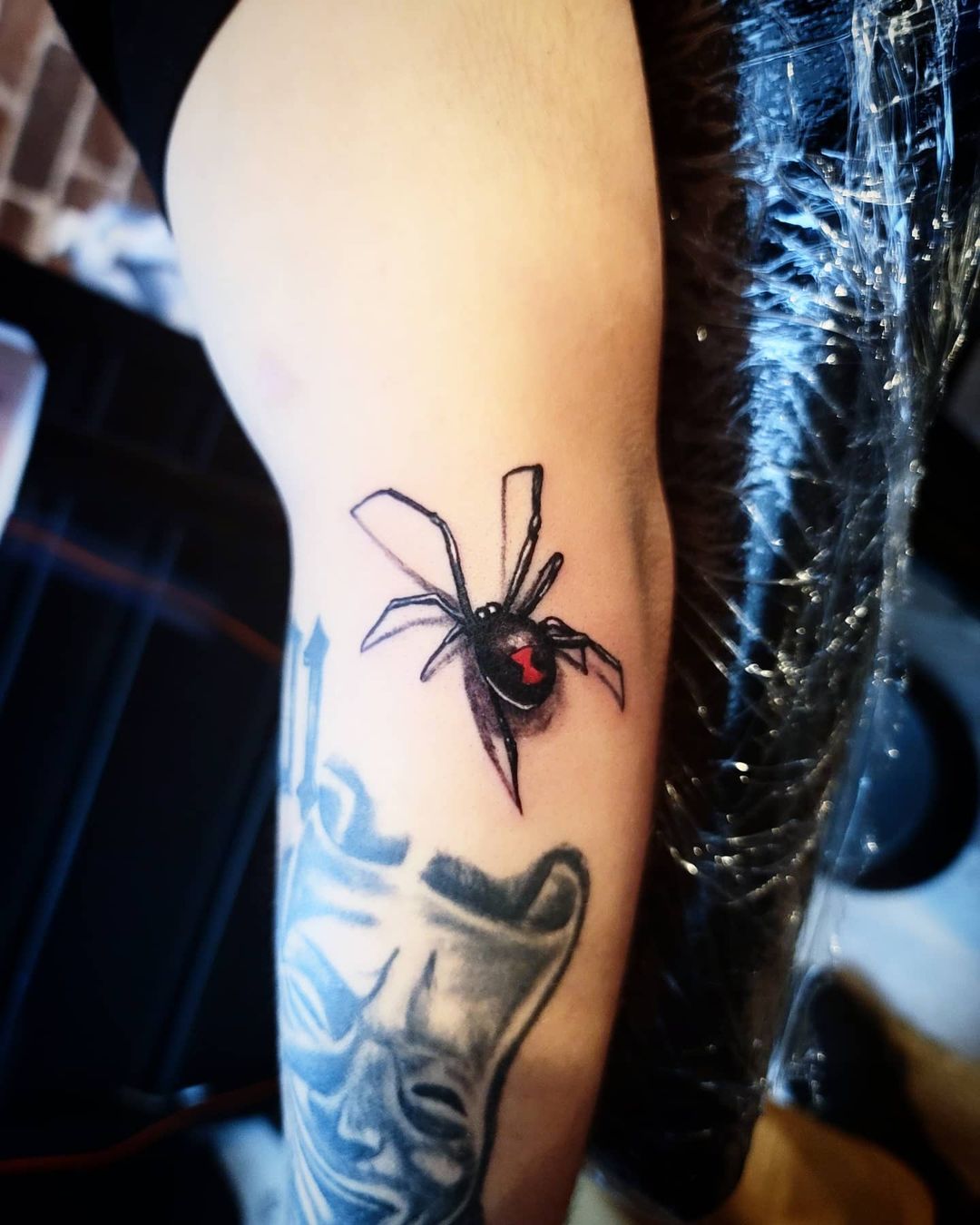 Black Widow Spider Tattoo on hand