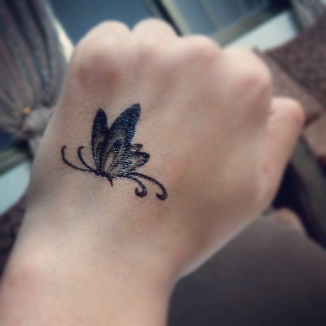 Butterfly Hand tattoo design ideas