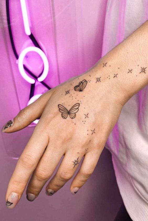 Butterfly Hand tattoo design look