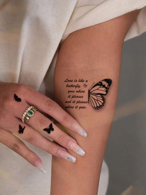 Butterfly Hand tattoo design with quote