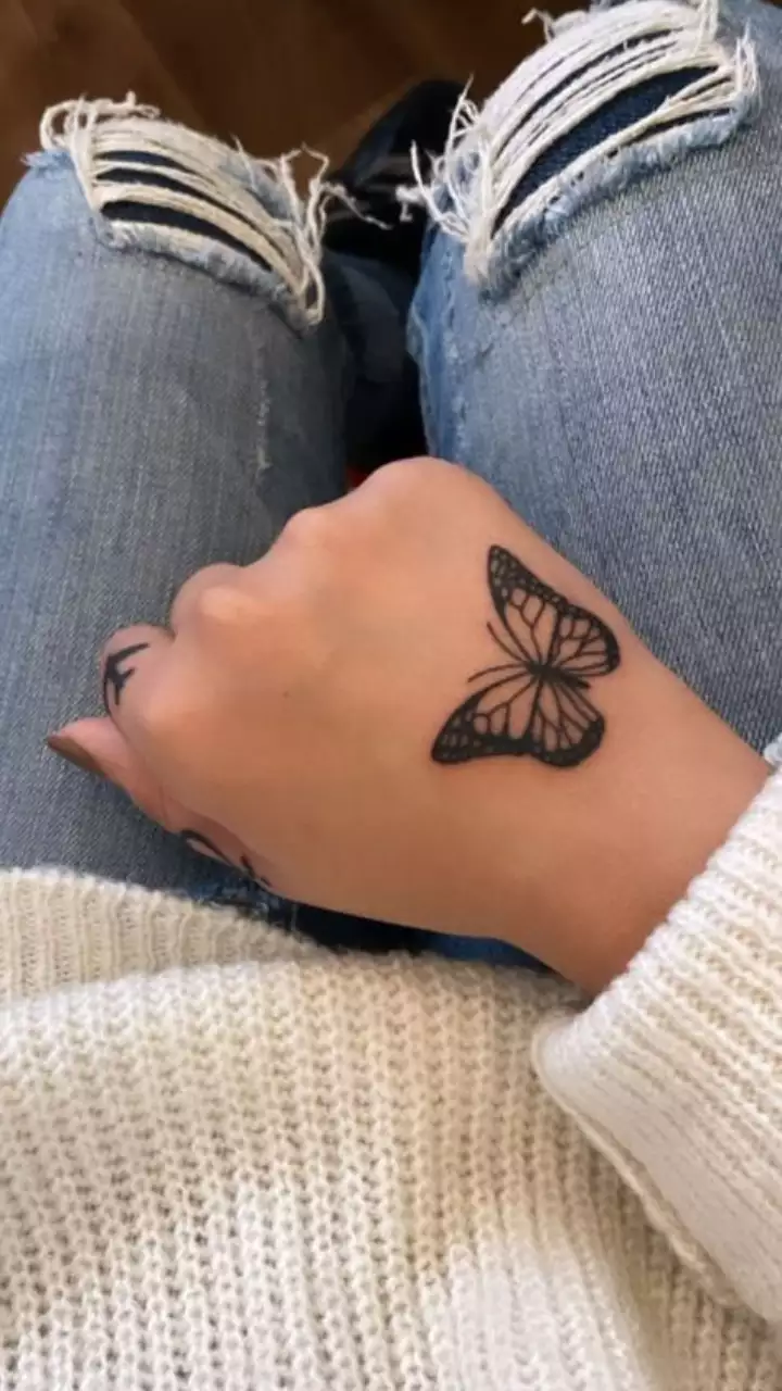 Butterfly Hand tattoo design