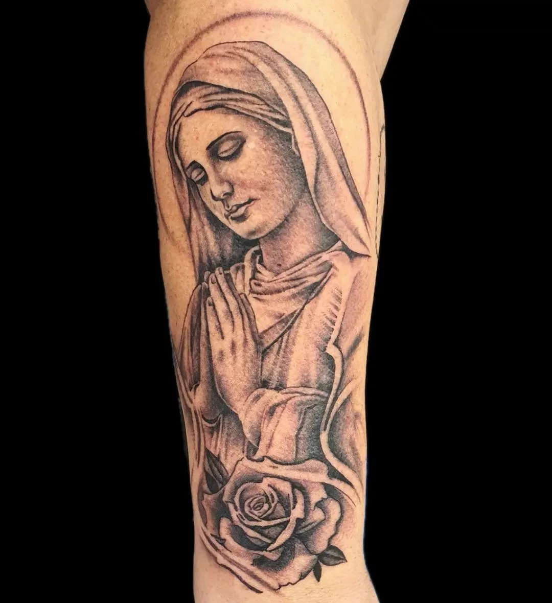 Classic black and grey Virgin Mary tattoo