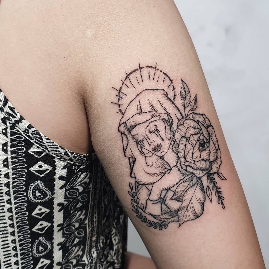 Crying virgin Mary tattoo