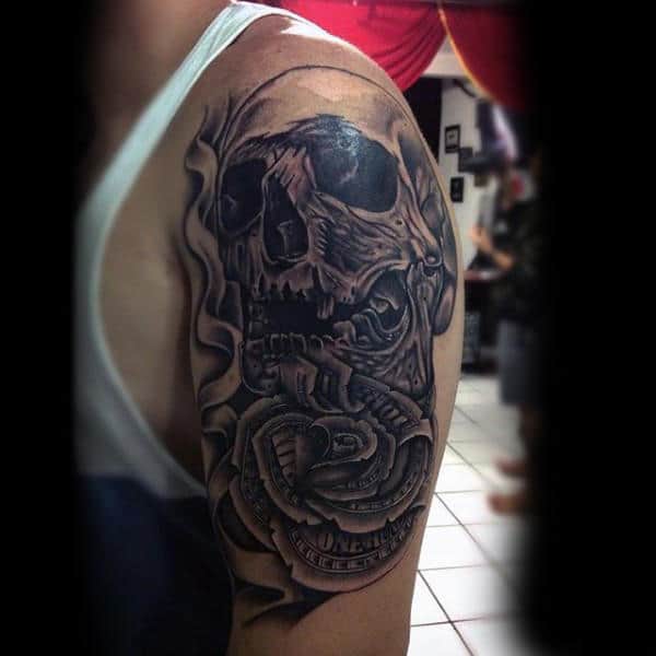 male-with-skull-and-money-rose-tattoo-on-upper-arm