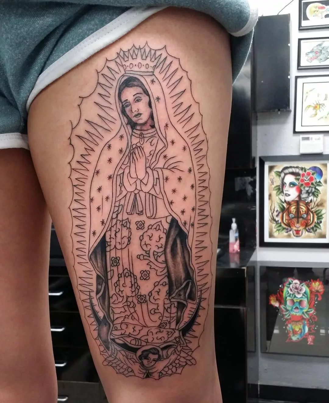 virgin mary tattoo outline on leg