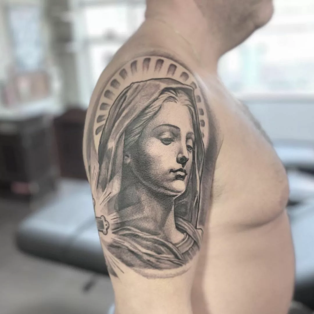 virgin mary tattoo shoulder